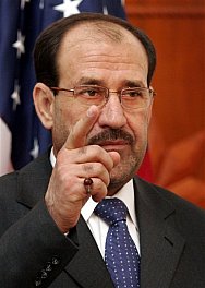Nouri Al-Maliki gestures